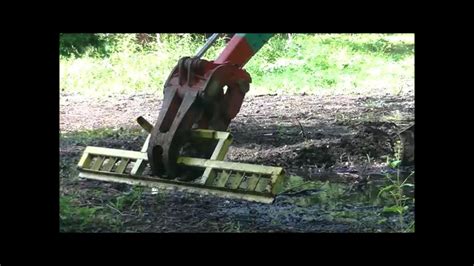 mini excavator grading rake|rotator attachment for mini ex.